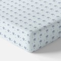 Jersey fitted sheet with flowers blue with stars