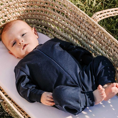 Navy blue baby sleepsuit made of merino wool