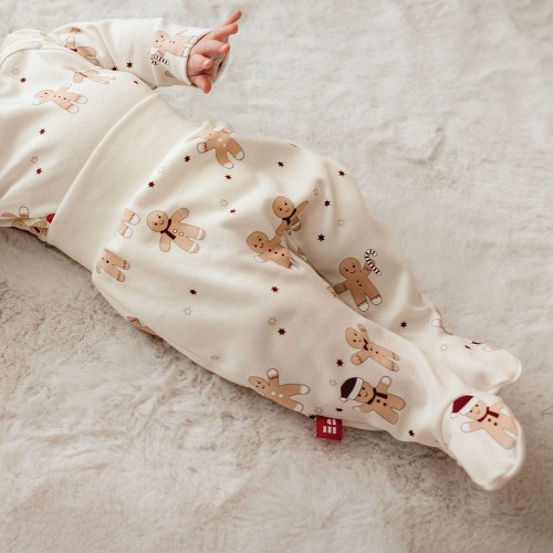 Joggers with feet with a Christmas gingerbread and star pattern ecru