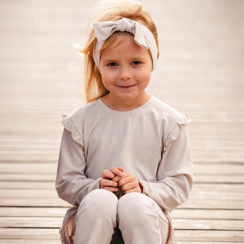 Beige Baumwollbluse mit Rüschen auf den Schultern