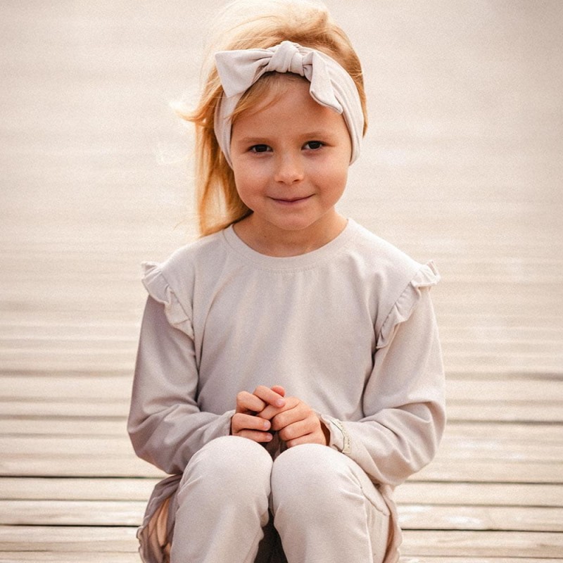 Beige Baumwollbluse mit Rüschen auf den Schultern