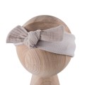 Beige girls’ headband with muslin bow