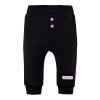 Schwarze Leggings mit Knöpfen