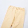 legginsy dziecięce żółte z bawełny pastelowe