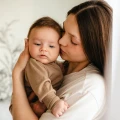 Caramel merino baby romper growing with your child