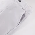 Set aus weißem Hemd-Body, grauer eleganter Hose und grauem Sakko