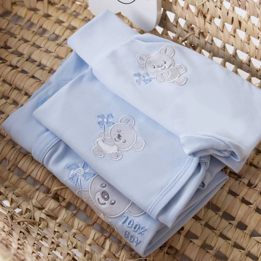Baby-Set mit Body, Strampler, Halbstampler und Mützen in Blau