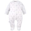 Baby-Set: Body, Strampelhose, Mütze und weißer Strampler mit blauen Ballons