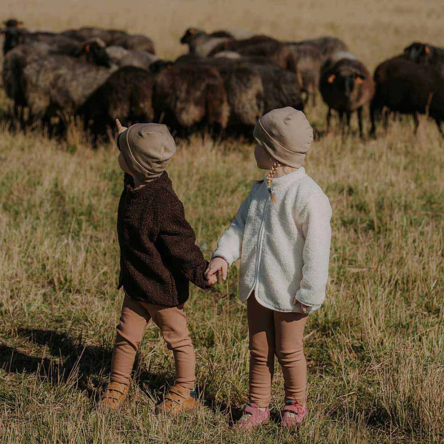 Kinderjacke aus Teddyfleece in Ecru