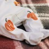 Baby-Set Halloween – Wickelbody und Strampelhose in Ecru mit Kürbismuster