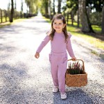 Kinderbody mit Rüschen in Heidekraut