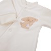 Ecrufarbener Baby-Strampler aus Velours mit Hundemotiv