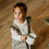 Elegante Babybodys mit Rüschen in Ecru
