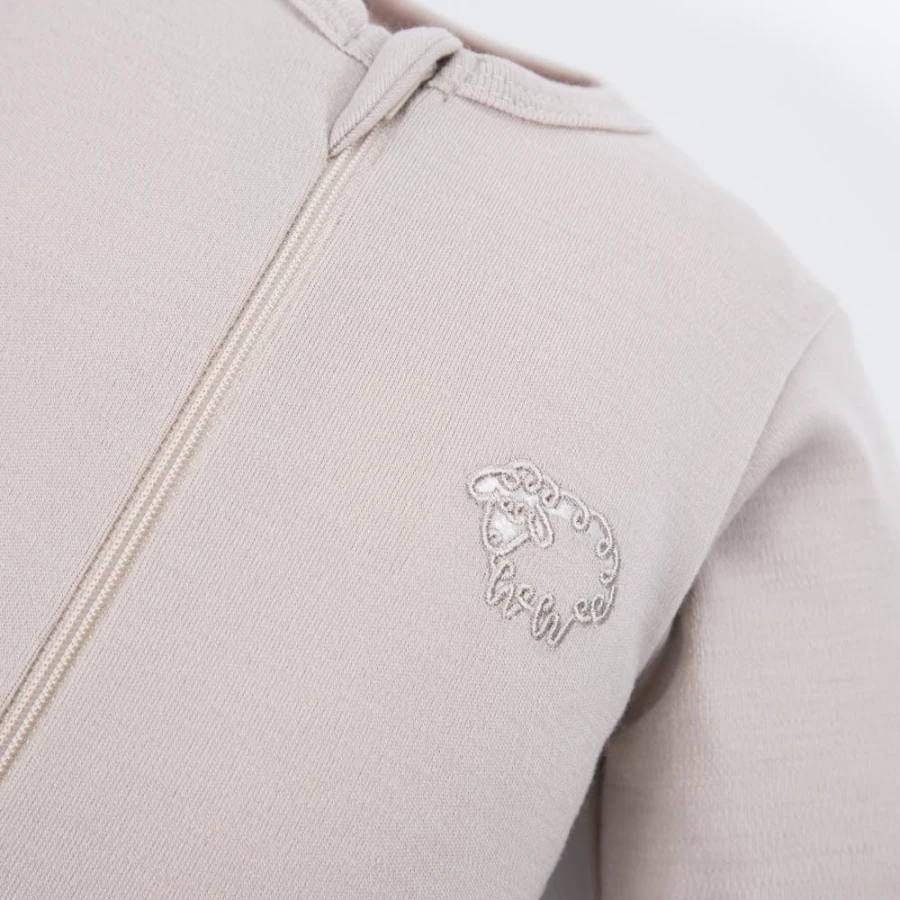 Strampler aus Merinowolle, der mit dem Kind mitwächst, beige